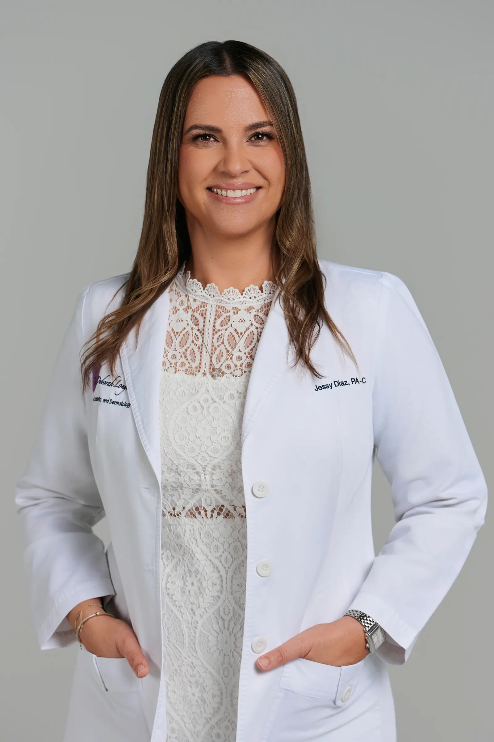 Female doctor smiling in white coat